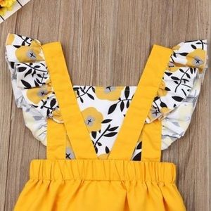 Yellow floral romper.